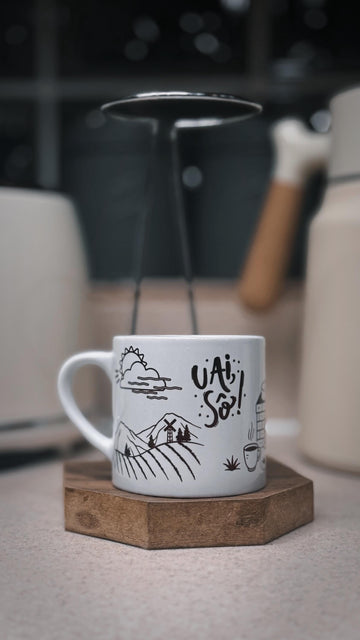 White espresso mug with 'Uai sô' Minas Gerais phrase in black