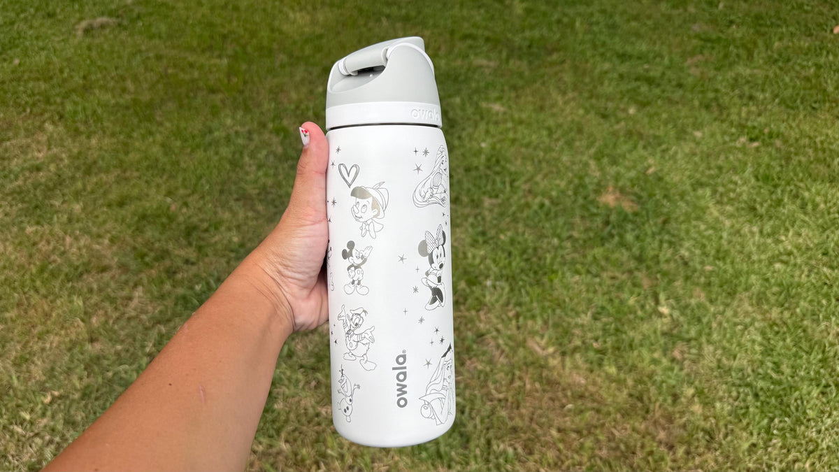 Back of a white Owala showing more engraved character artwork