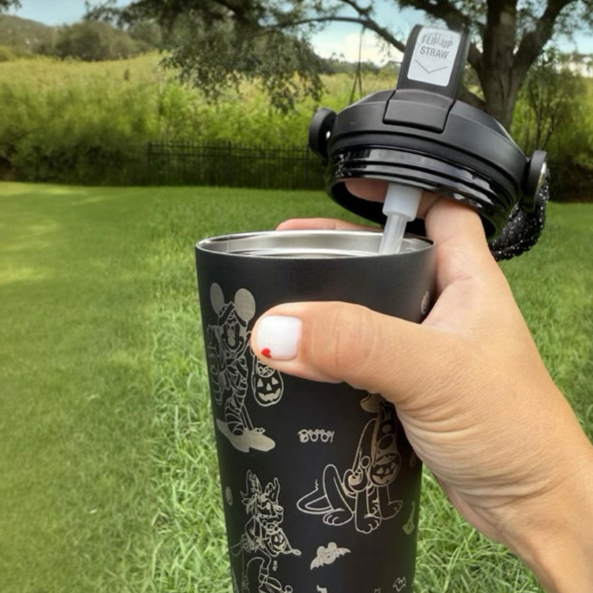 Open lid of a black 24 oz Halloween tumbler