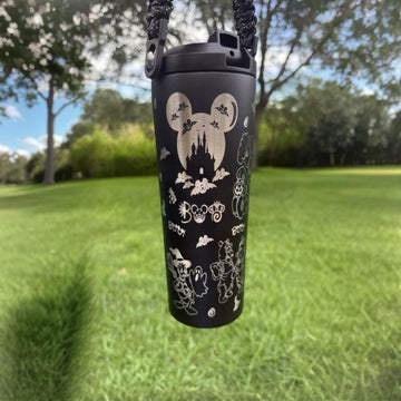 Black 24 oz tumbler with a scary Mickey-inspired Halloween design