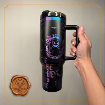 Black 40 oz tumbler with handle, laser engraved with an Oogie Boogie-inspired Halloween design