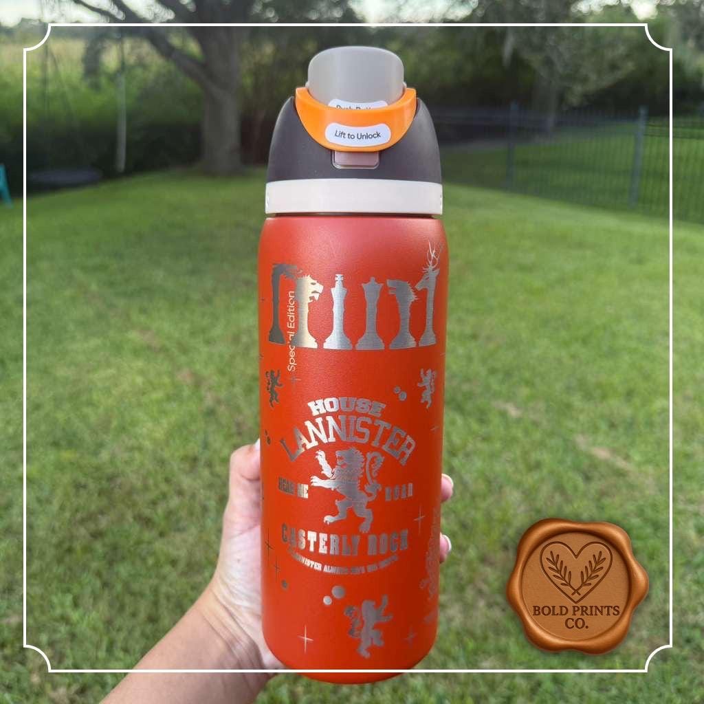 Orange Owala FreeSip laser engraved with a Game of Thrones-inspired design