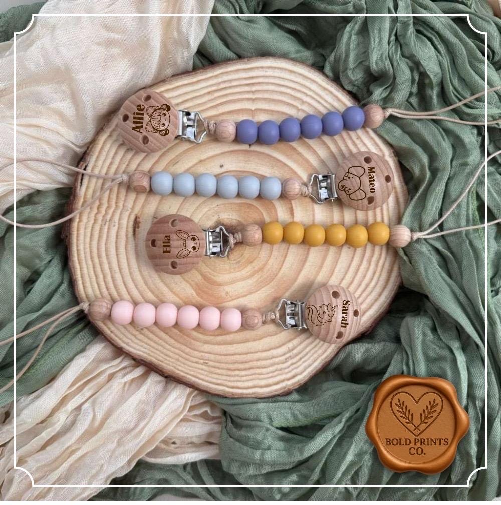 Personalized baby pacifier clips with silicone beads and engraved beechwood name discs