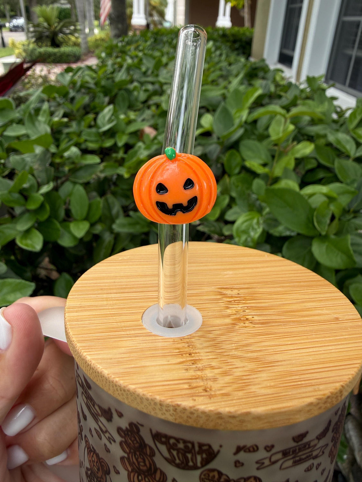 Close-up of the pumpkin straw topper and bamboo lid