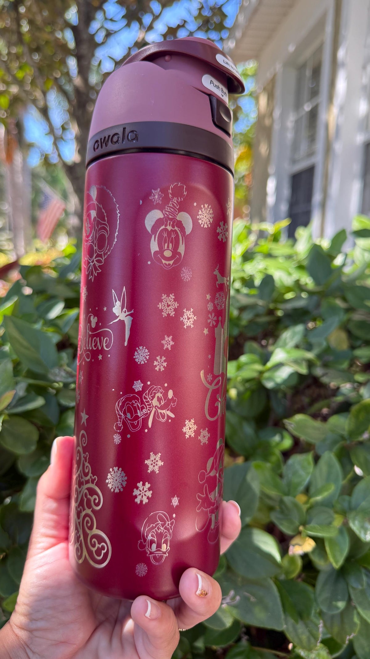 Back of a red Owala showing more Mickey-inspired winter engraving