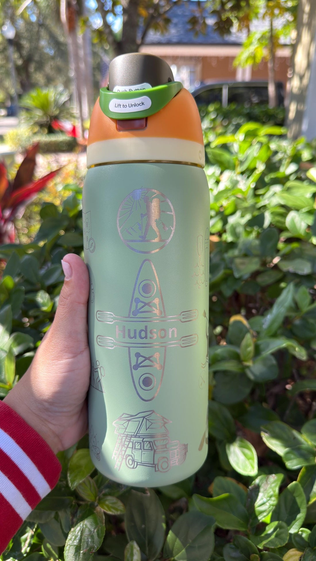 Sage green Owala FreeSip laser engraved with outdoor adventure icons for hiking and kayaking