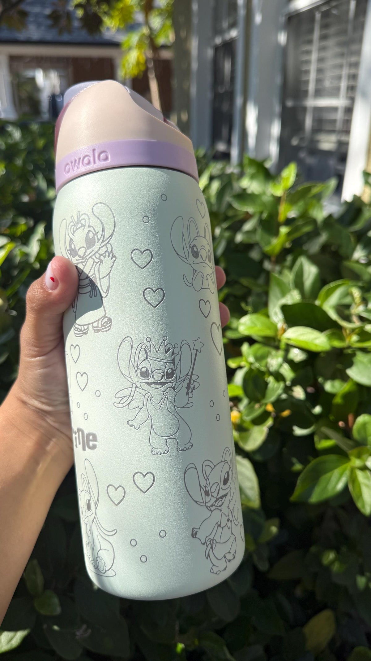 Mint green Owala FreeSip with engraved Angel artwork and name