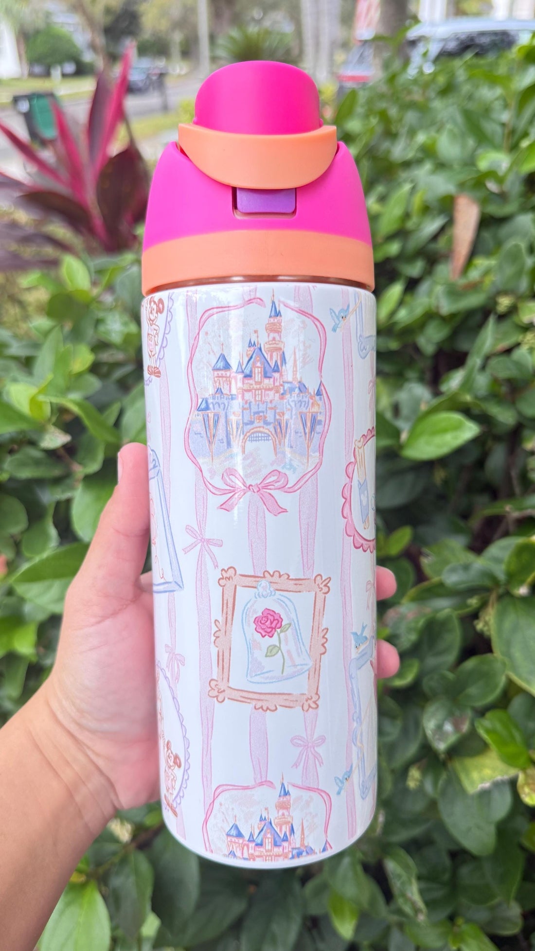 White 24 oz FreeSip-style tumbler with a pink fairy tale castle design