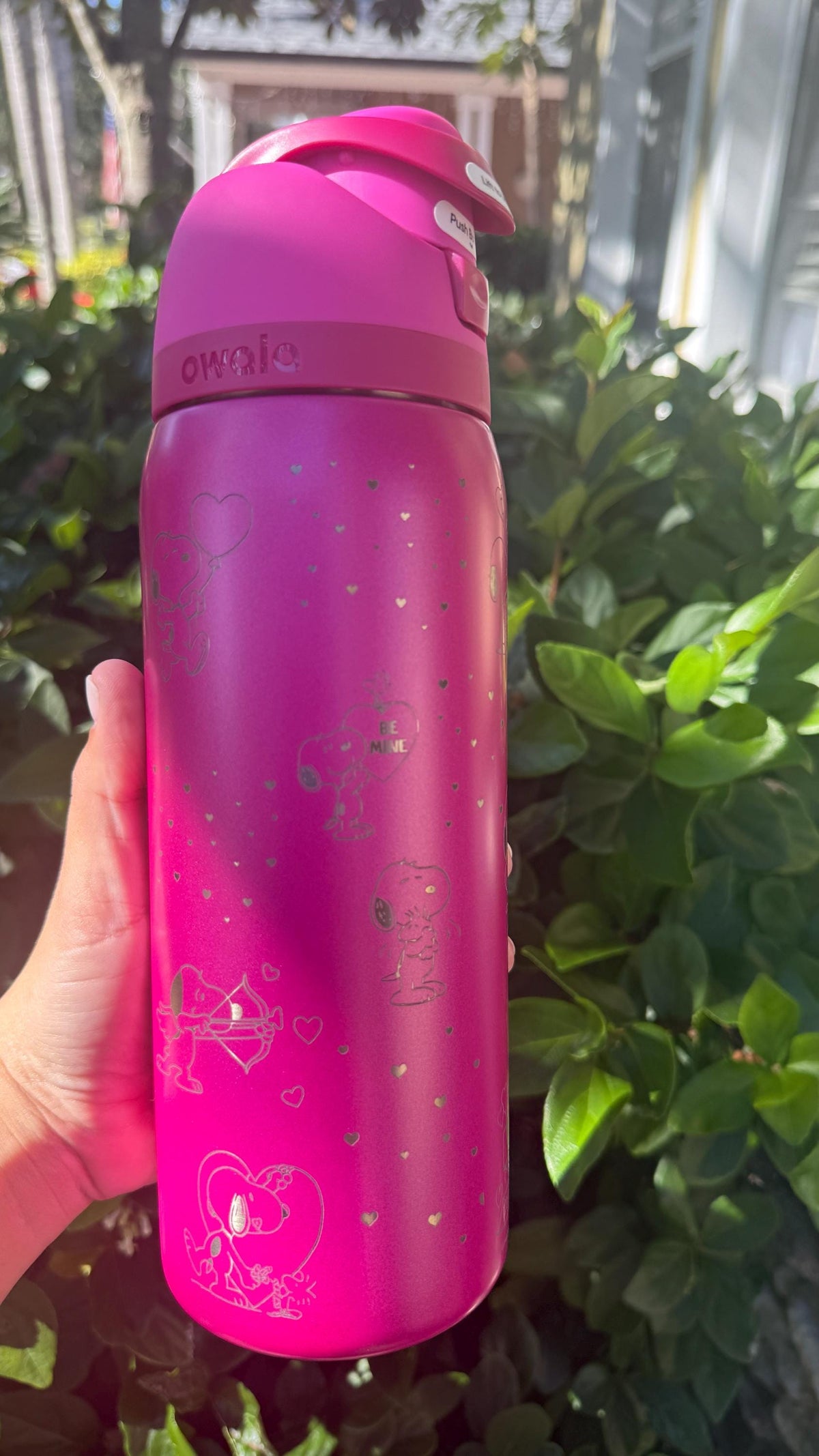 Magenta Owala water bottle with Snoopy Valentine's engraving