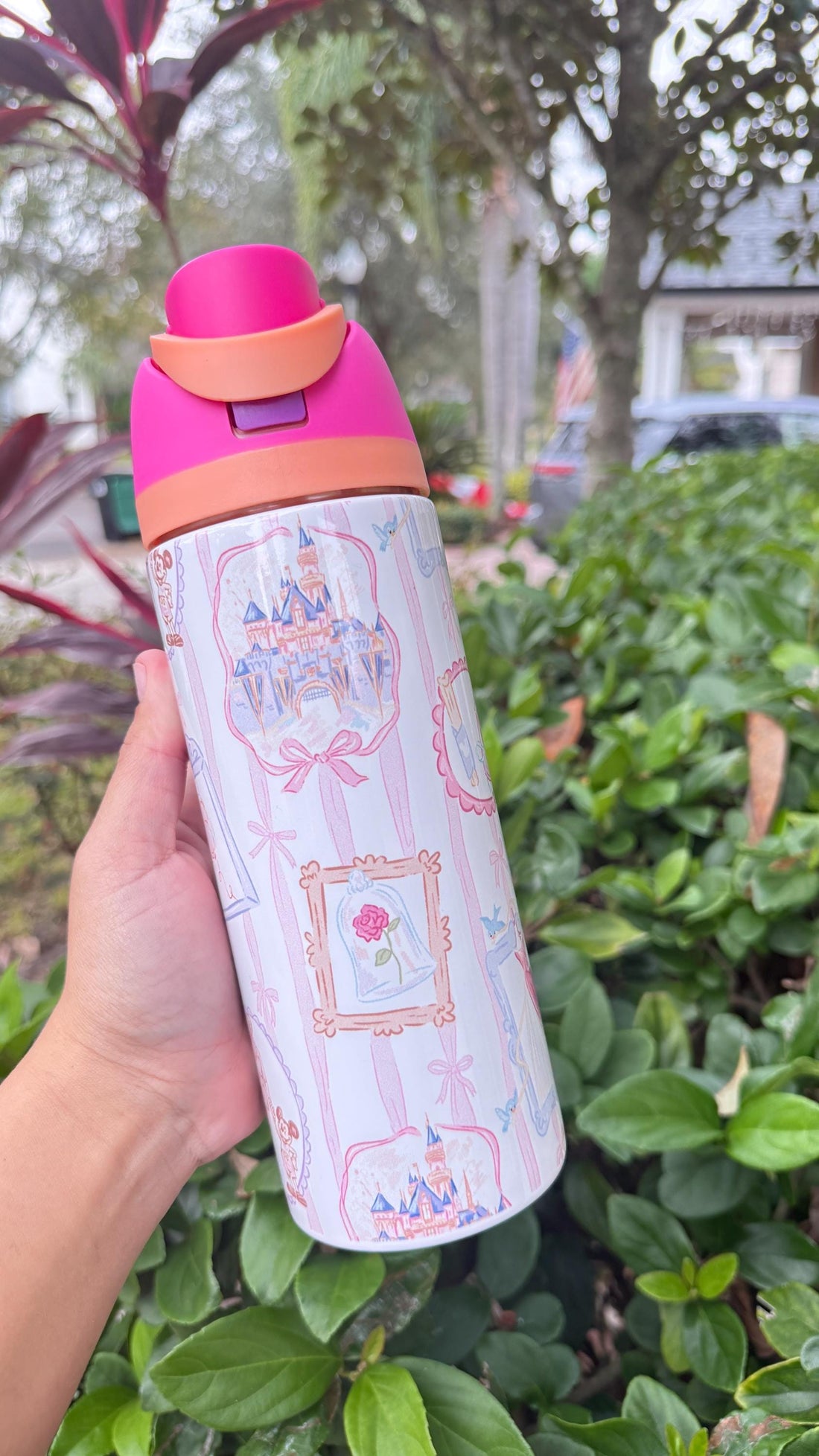 White 24 oz FreeSip-style tumbler with a pink fairy tale castle design