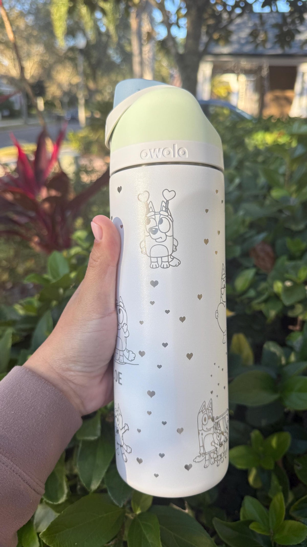 Close-up of engraved hearts on a Bluey Valentine's Owala