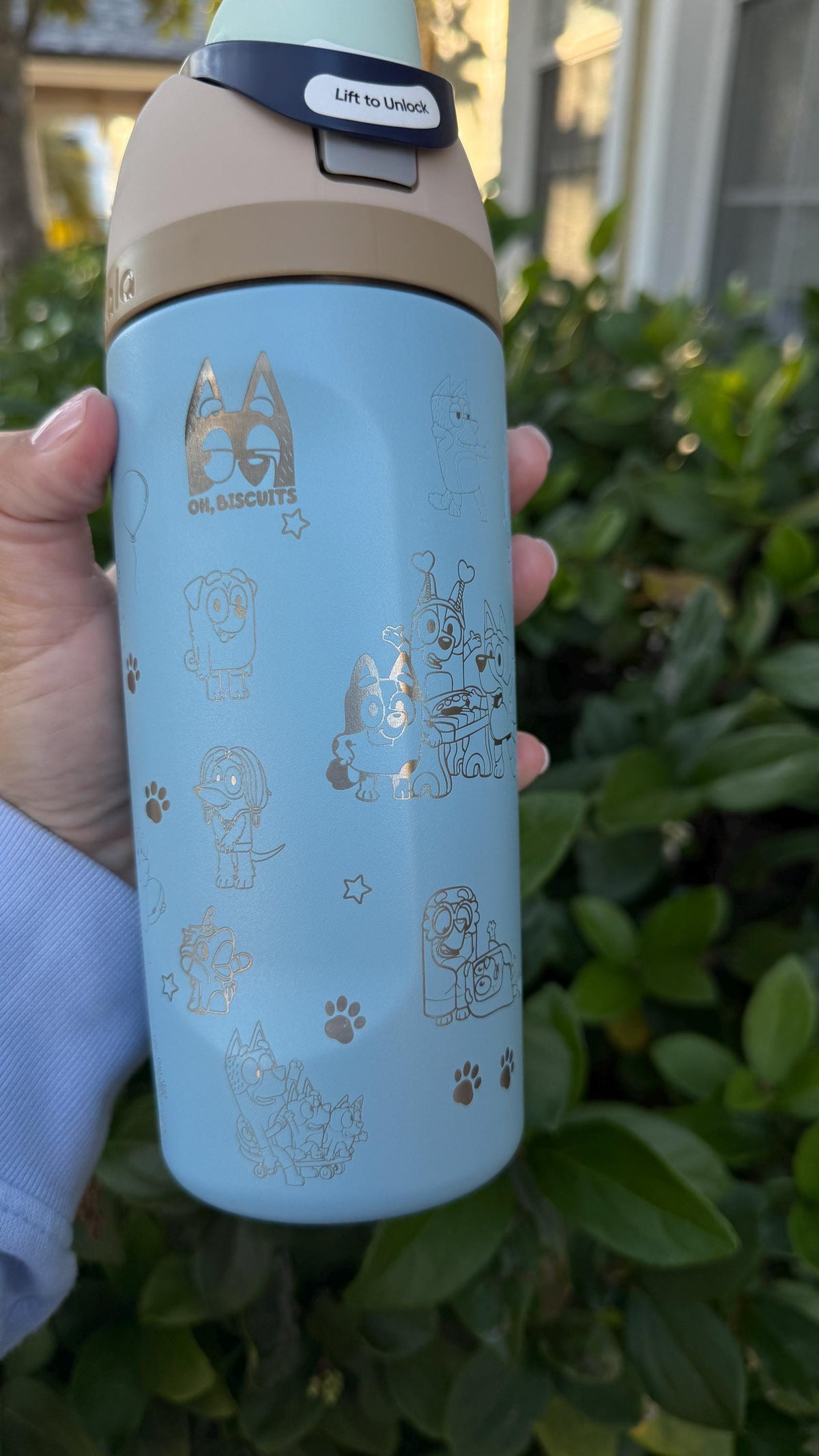 Light blue Owala FreeSip with Bluey and Bingo-inspired engraving