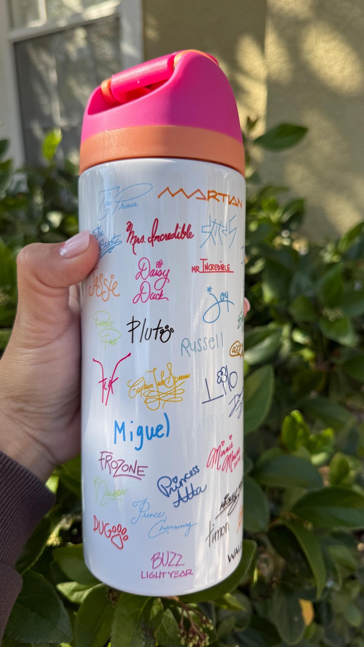 Close-up of printed autograph-style signatures and the name Miguel