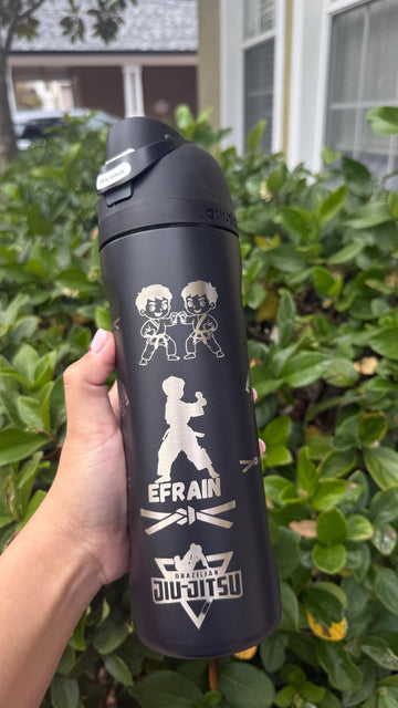 Black insulated water bottle laser engraved with Brazilian Jiu-Jitsu kids artwork and a name