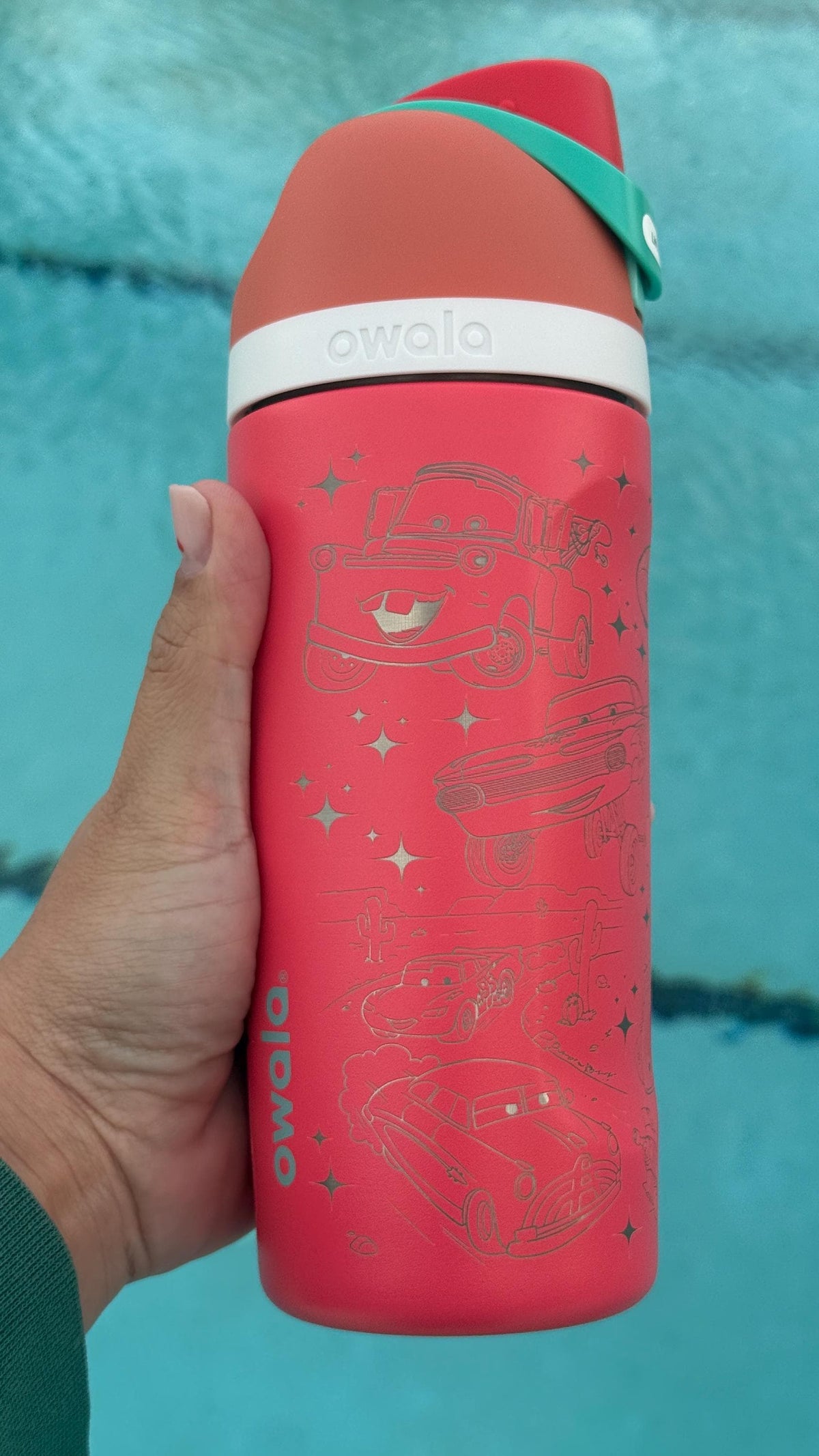 Back of a red Owala FreeSip with more Lightning McQueen-inspired engraving
