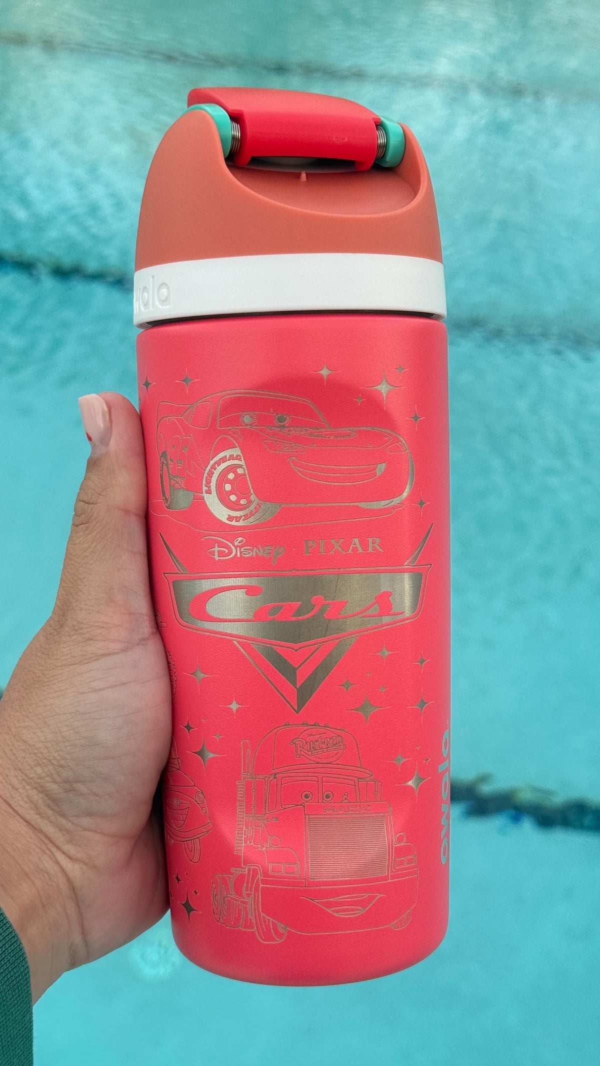 Red Owala FreeSip laser engraved with a Lightning McQueen-inspired Cars design