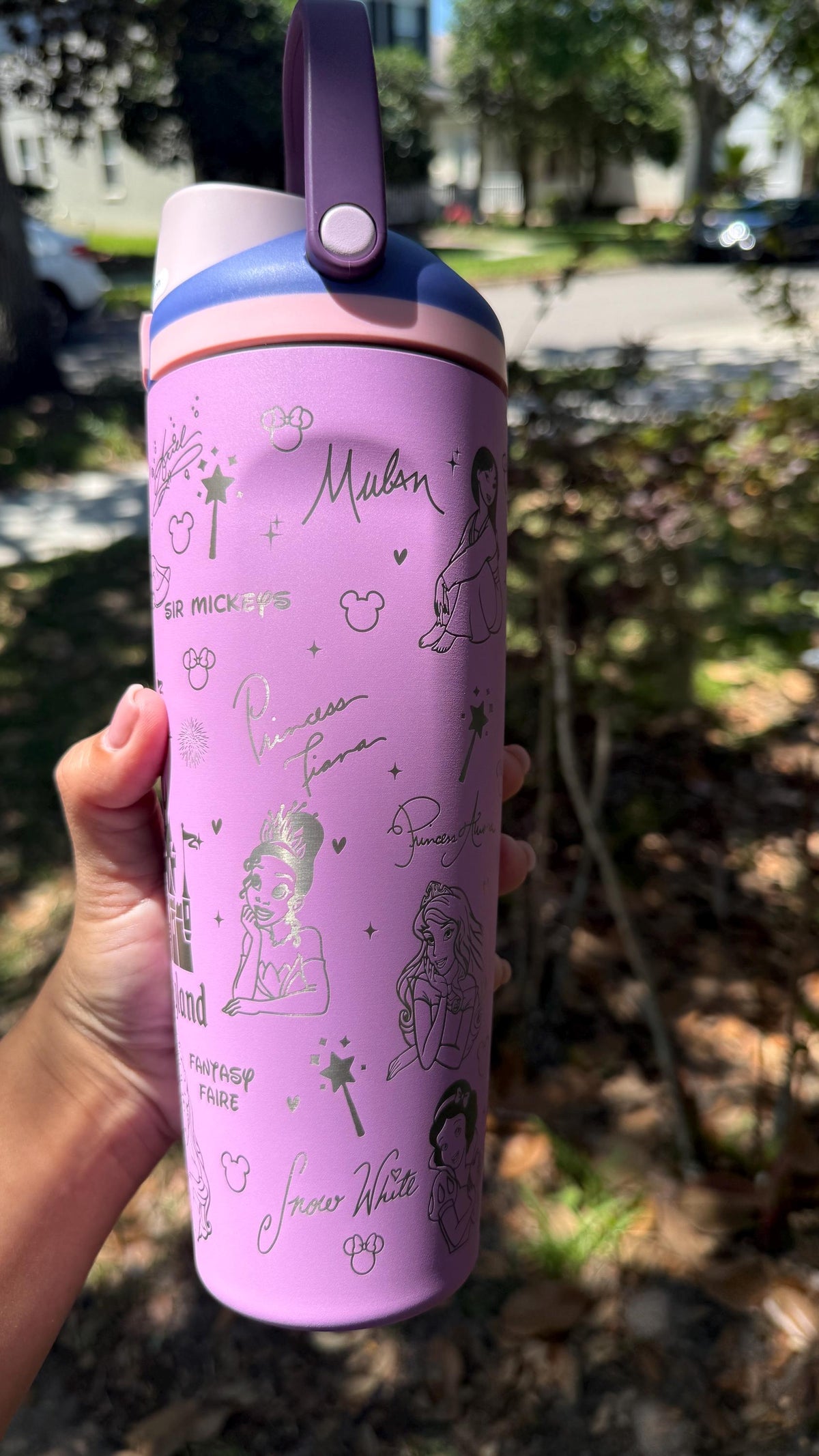 Back of a lilac Owala Sway showing more castle-inspired engraving