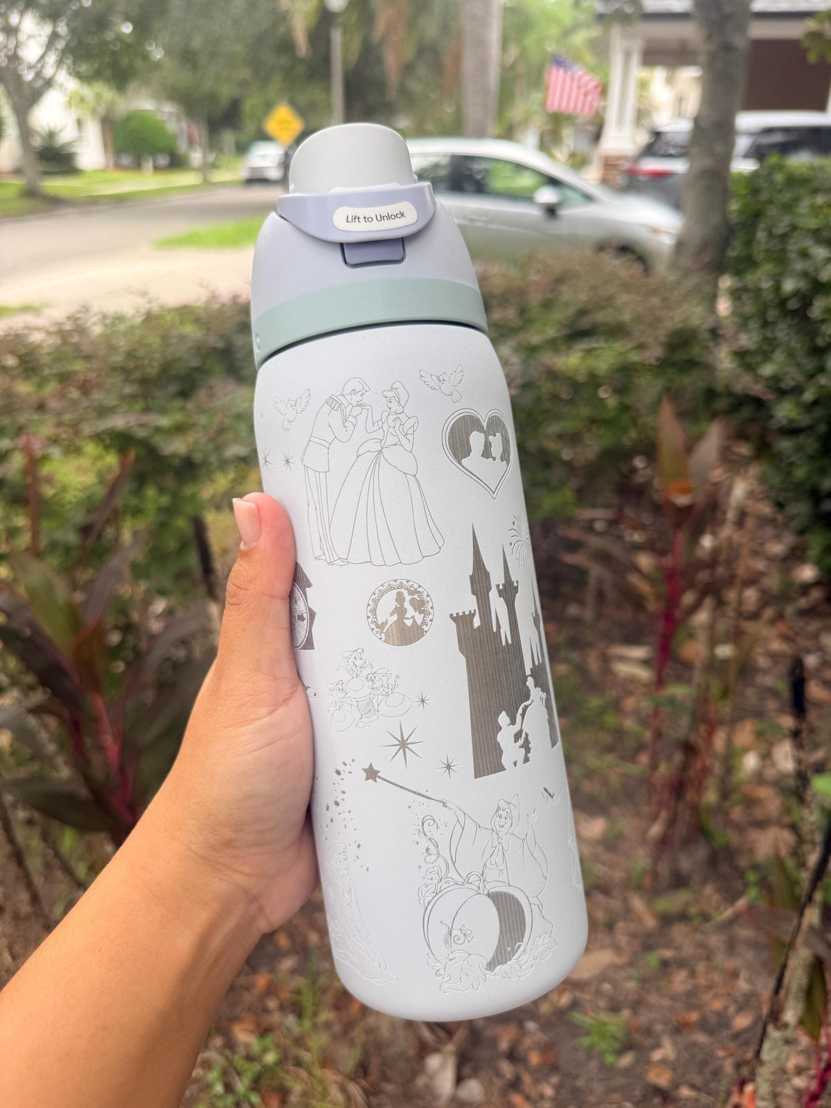 White Owala FreeSip with an engraved fairy tale castle