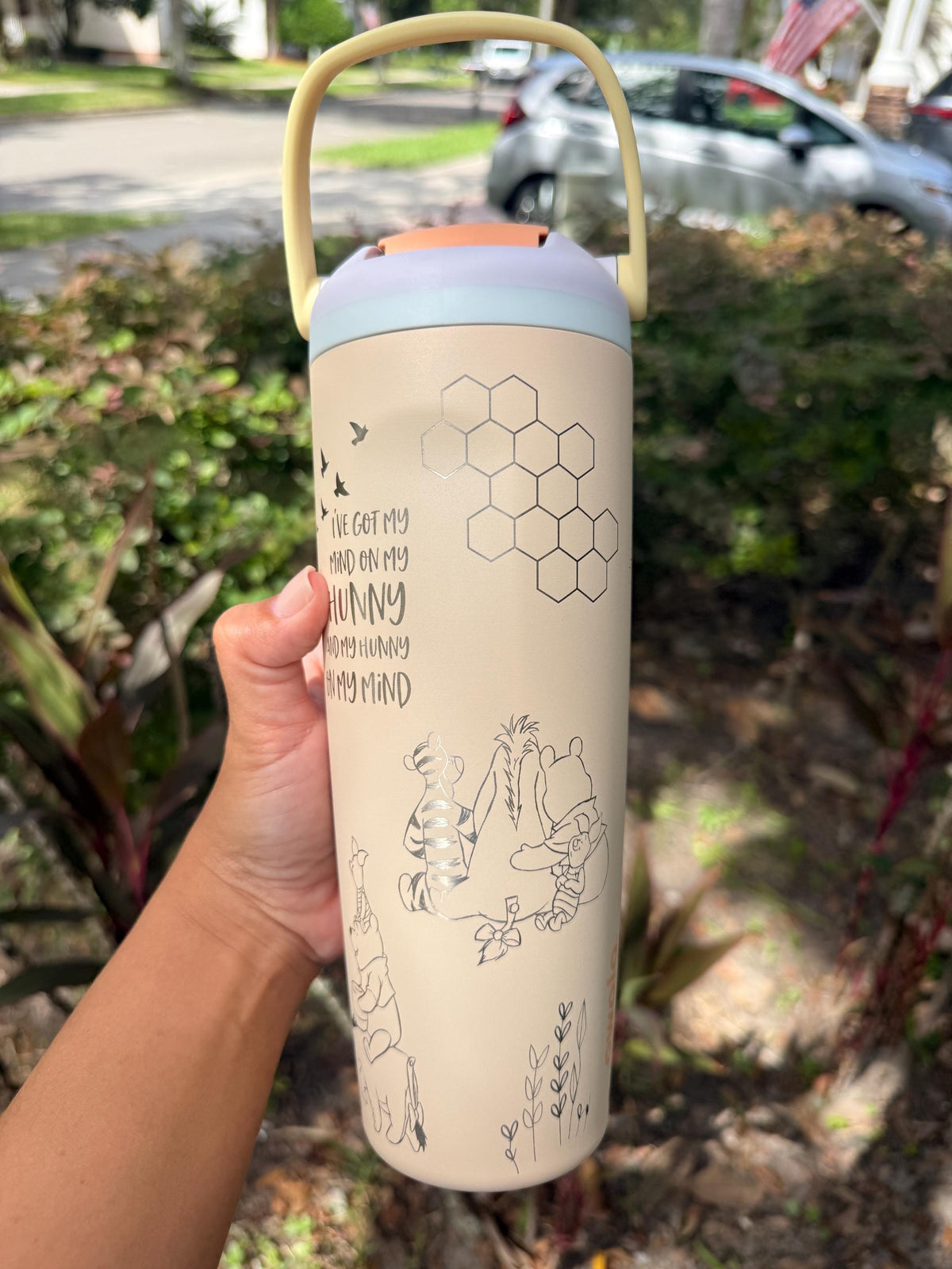 Honeycomb engraving on a cream Owala FreeSip Sway
