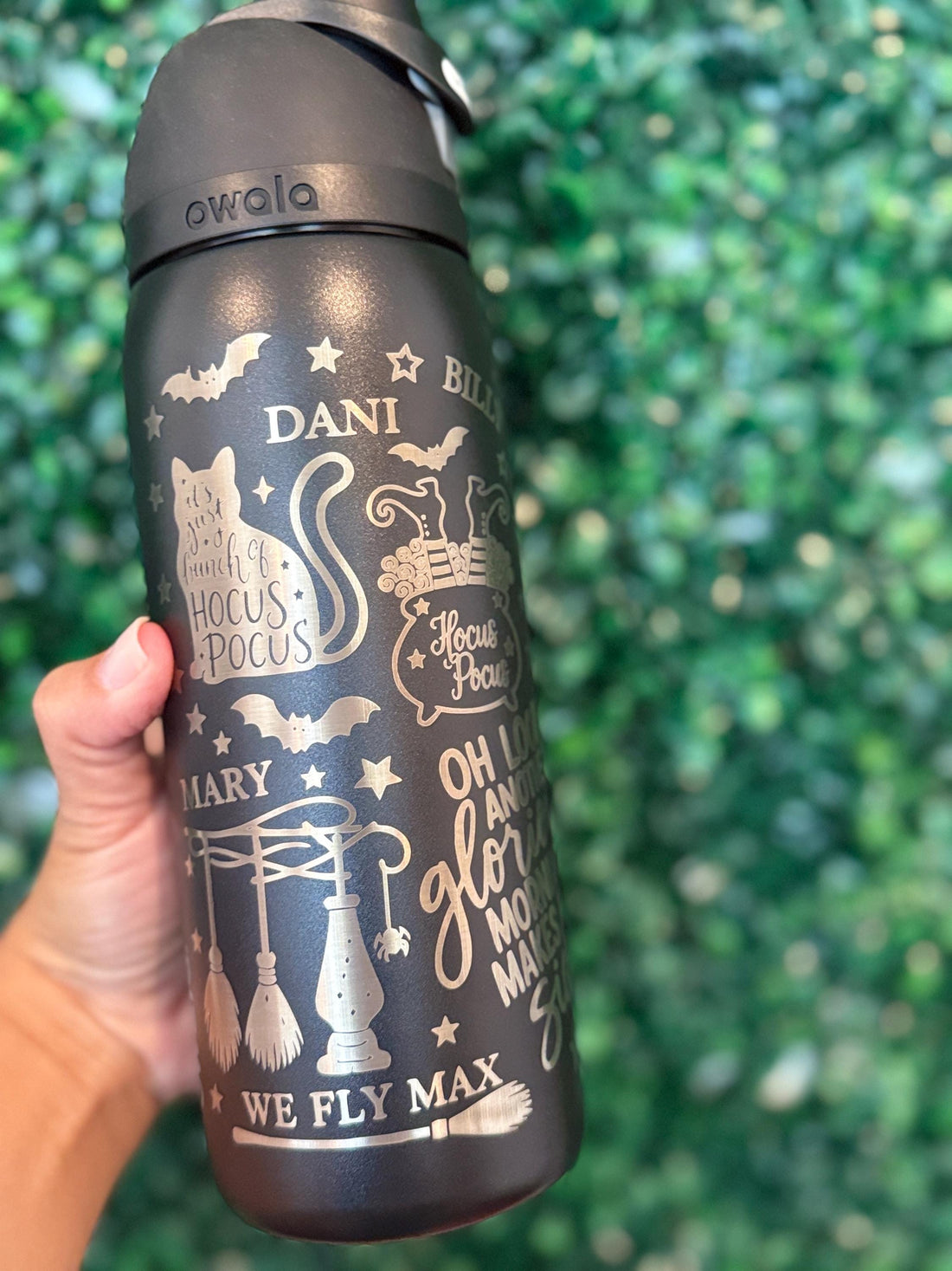 Black Owala FreeSip laser engraved with Hocus Pocus-inspired Halloween artwork and a name
